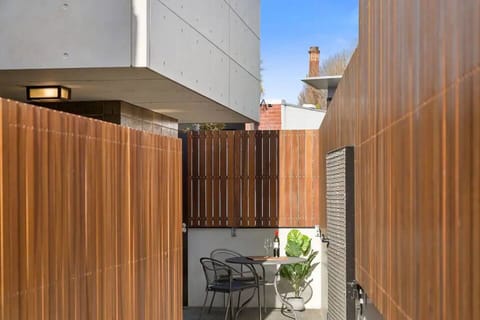 Step out to the serene patio, ideal for alfresco dining or a peaceful morning coffee amidst the fresh air.