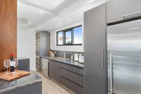 Cook up a storm in the fully equipped kitchen, featuring modern appliances and plenty of counter space.