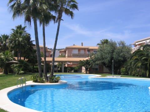 Beautiful pool, right outside the apartment garden gate.