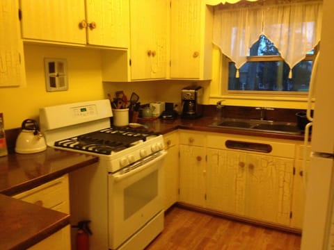 gas range, copper counters, well stocked kitchen