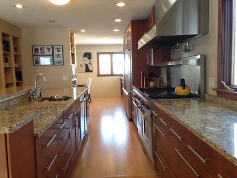 A great place to entertain, plenty of cabinet and counter space and a library.