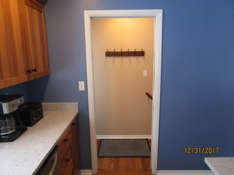 Additional coat rack off kitchen.