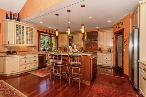 Gourmet kitchen, pantry, 48" gas range, breakfast island, stainless appliances