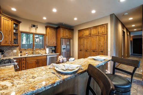 The kitchen bar seats three comfortably!