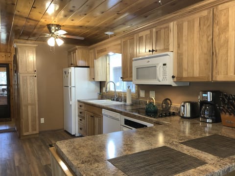 Appliances include fridge with ice maker, dishwasher, oven, microwave, coffee maker, all kitchen essentials for making your meals(pots, pans, dishes)