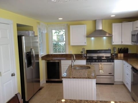 Chefs kitchen, granite, stainless, pantry, wine fridge, huge stove, island sink