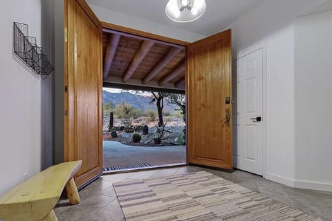 Covered front porch & entryway with easy key code lock.