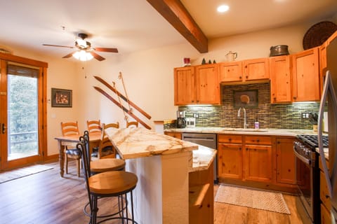 Newly updated kitchen features granite counters & backsplash & new appliances.