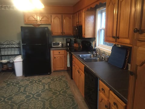 Kitchen next to spiral stairs to 4th floor