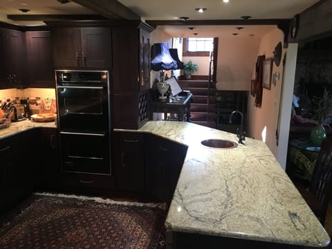 Kitchen view toward front entry