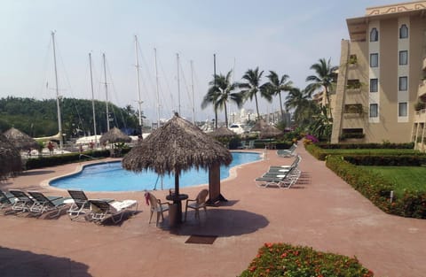 Marina Residences pool with water way behind. 