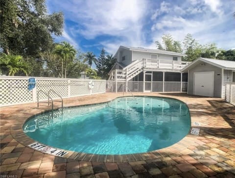 The community pool is always a cozy place to mingle. With only 14 homes to share