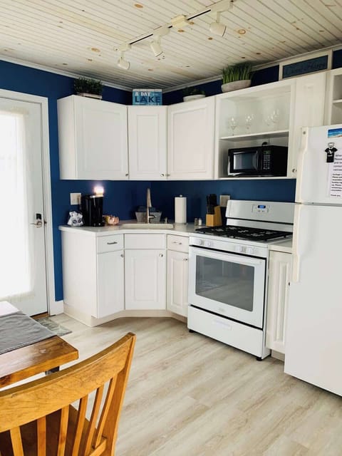 Downstairs Kitchen- Charming and fully equipped with all your essentials.