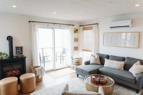 Relax and recharge in this bright and cozy lake-view living area.