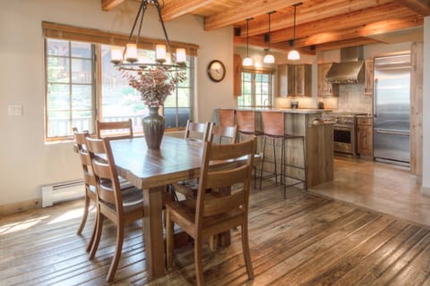 Elegant mountain lodge dining room and kitchen