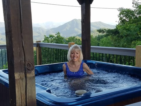 A magnificent four person hot tub on main deck is elevated to enjoy the view.