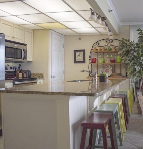 large eat in counter plus table and chairs