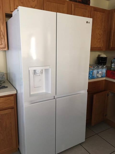 We have replced the old fridge/freezer  Chilled water and Ice delivered