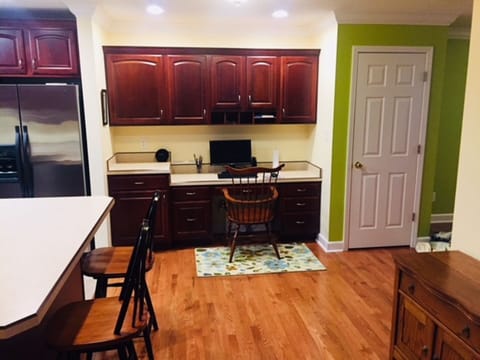 Desk area adjacent to kitchen