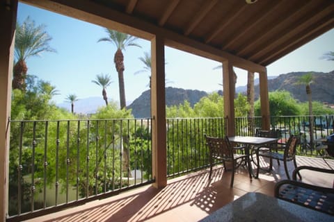 Front corner upper unit means open views of palm trees and surrounding mountains