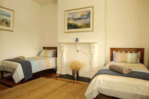 Original timber floors throughout and striking local artworks