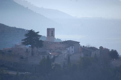 The castle rises above the valley of Spoleto