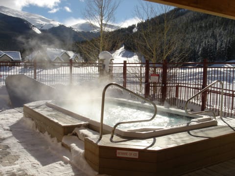 Watch skiers & tubing hill from large hot tub