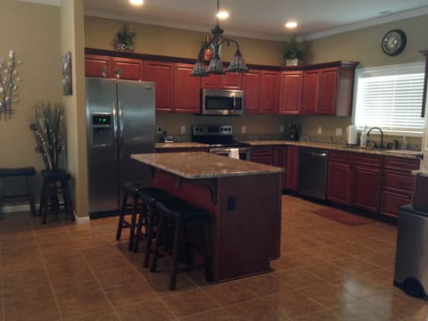 Spacious, well organized kitchen with island.