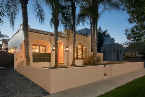 Before sunset on quiet tree-lined street walking distance to restaurants & bars