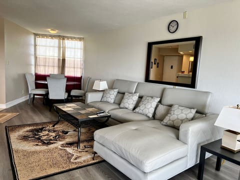 Another view of the Living wrong were there is also a large big screen TV
