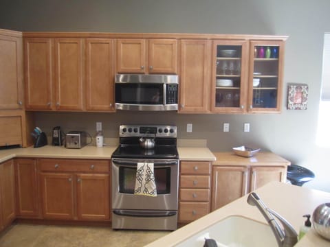 The kitchen is well appointed with stainless steel appliances.