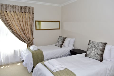 Bedroom 4, located on the ground floor.