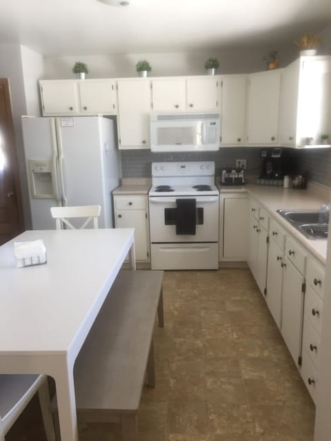 Table with two benches and two chairs seats 8!