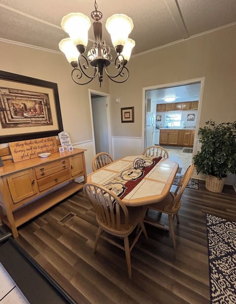Dining area - seats 4 (Also has small air hockey table on back wall)