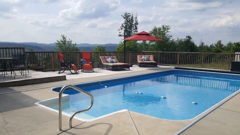 Pool with multiple loungers. Loungers open on both ends for diff. seating option