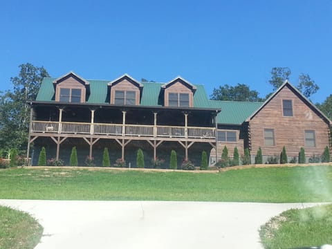 Exterior. Home is located on a steep hillside.