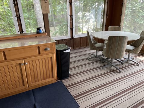 Bar and dining table on porch.