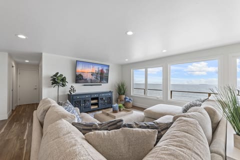 Living room that looks right onto the ocean