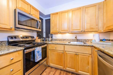 Enjoy cooking at your fully furnished kitchen with stainless steel appliances