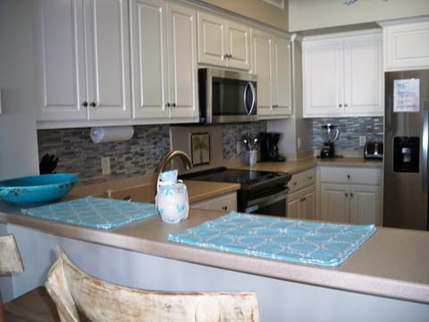 Kitchen features all new stainless steel appliances and gorgeous backsplash