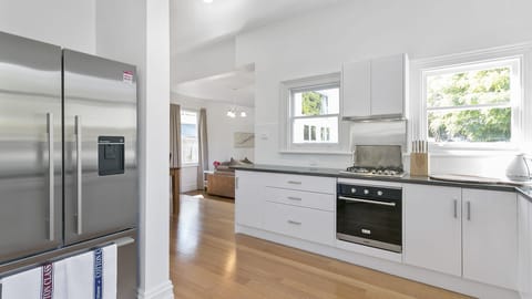 From kitchen looking through to dining and living area