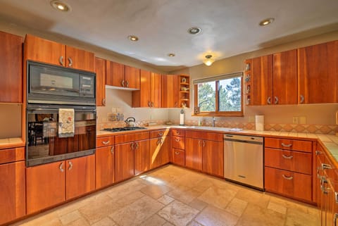 Gleaming cabinets hold everything you need to prepare your favorite dishes.