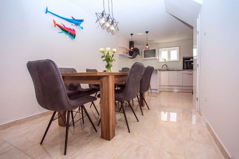 Very modern dining room suitable for 8 people.