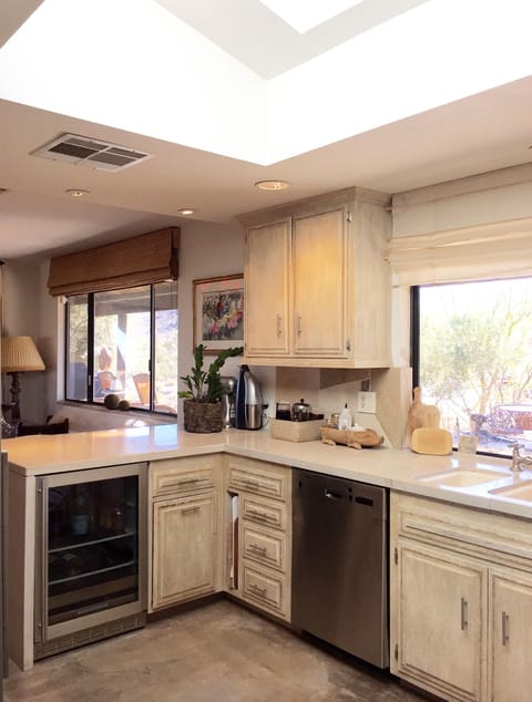 Kitchen skylight/stainless dishwasher & wine fridge