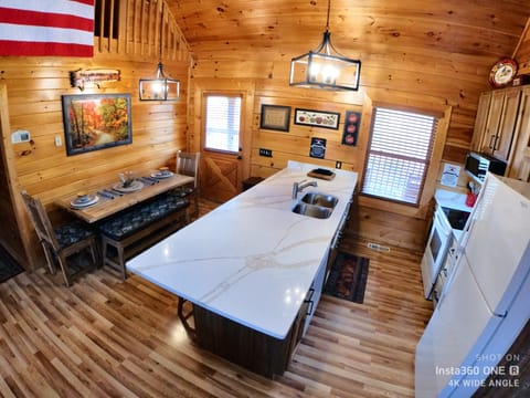 Newly remodeled kitchen, extended countertop, microwave, cabinets.