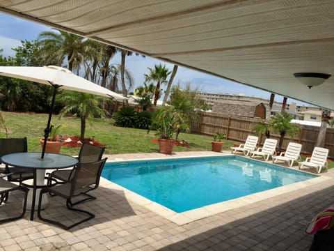 Tropical fenced in backyard 