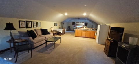 Open concept suite, living area, dining and we'll appointed kitchenette.