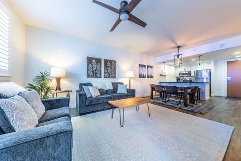 Living area & dining area - Gas fireplace, queen size sofa sleeper, access to private balcony, and newly upgraded 55" smart TV.