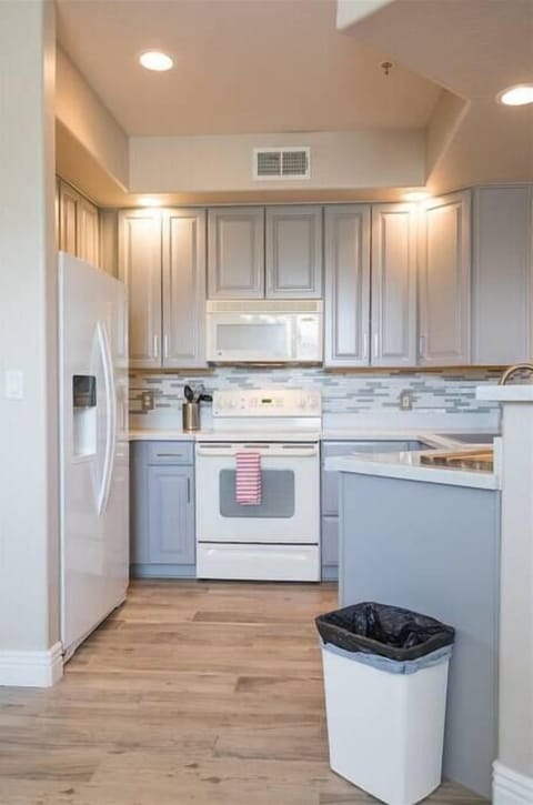 Eat in kitchen with high counter top and seating