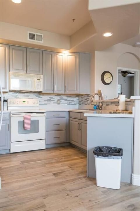 Eat in kitchen with high counter top and seating